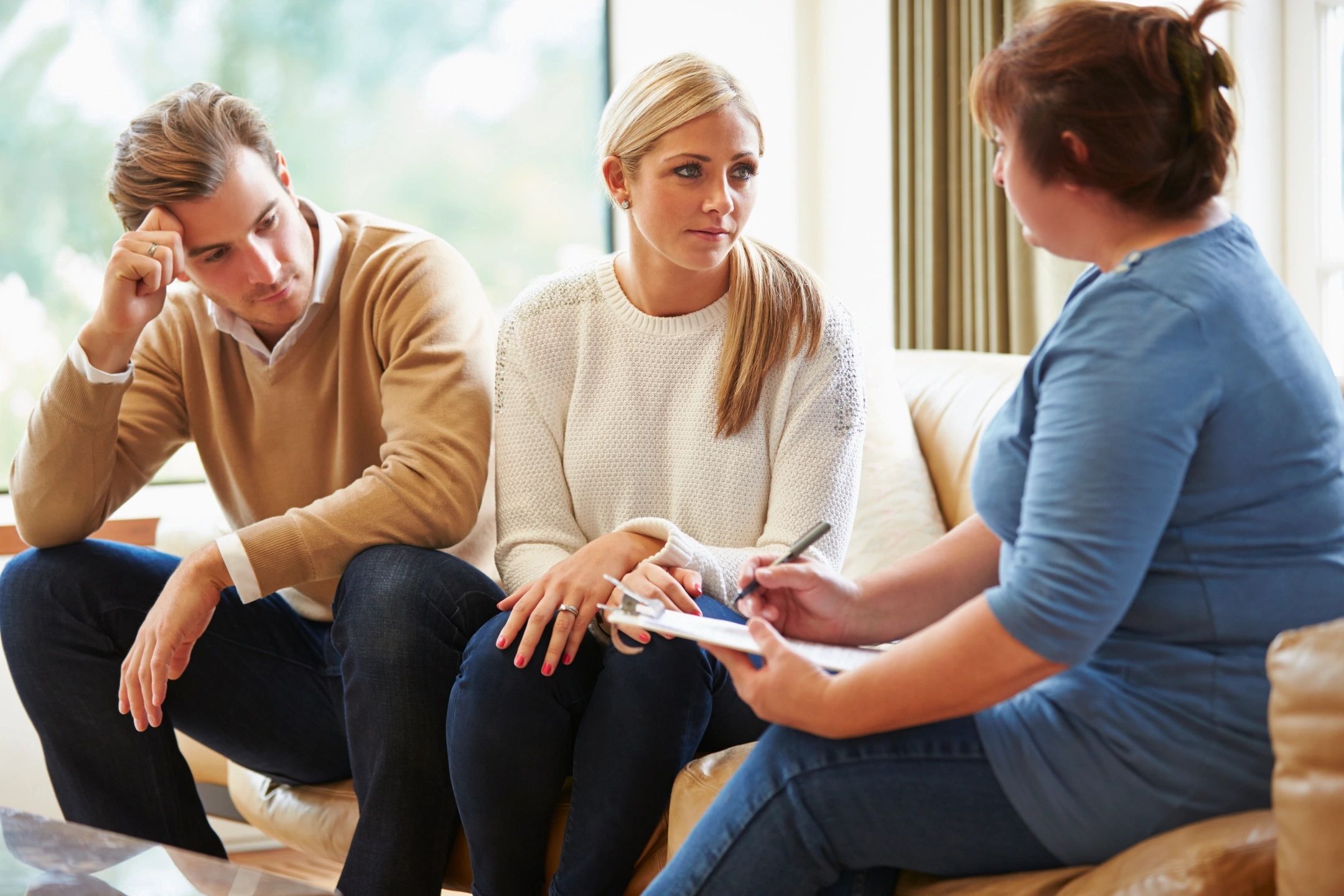 Husband and Wife speaking to a therapist